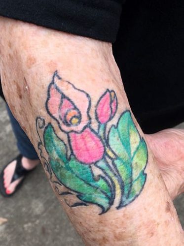 Debbie McDaniel shows her tattoo